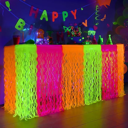 Mega-L Glow in The Dark Party Supplies, 4 Pack Neon Party Decorations Fluorescent Macaron Orange, Yellow and Fuchsia Wavy Metallic Tinsel Foil Fringe Table Skirts, Perfect Table Decors Glow Decors
